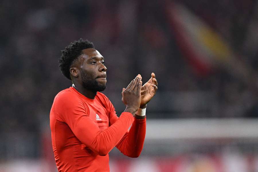 Alphonso Davies claps to the Canadian fans after the game Alphonso Davies claps to the Canadian fans after the game
