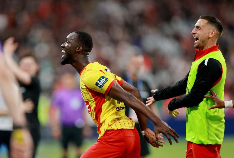 Sima celebrates his goal