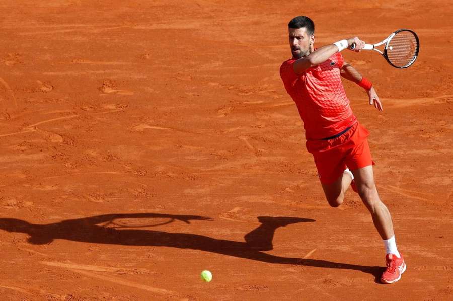 Novak Djokovic returns the ball to Ivan Gakhov during their first round match in Monte Carlo