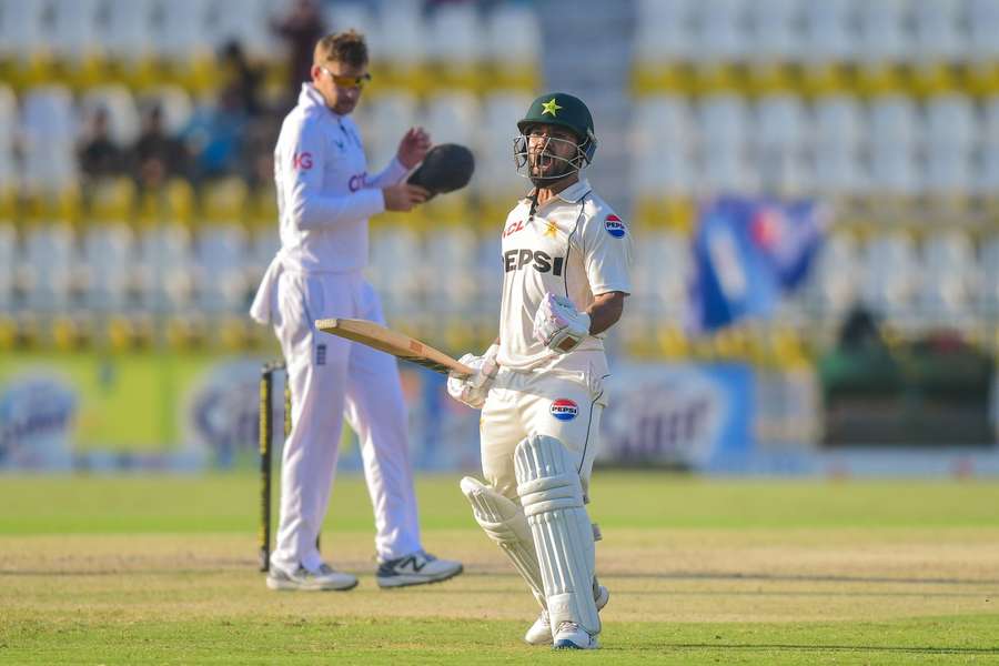 Kamran Ghulam celebrates his century