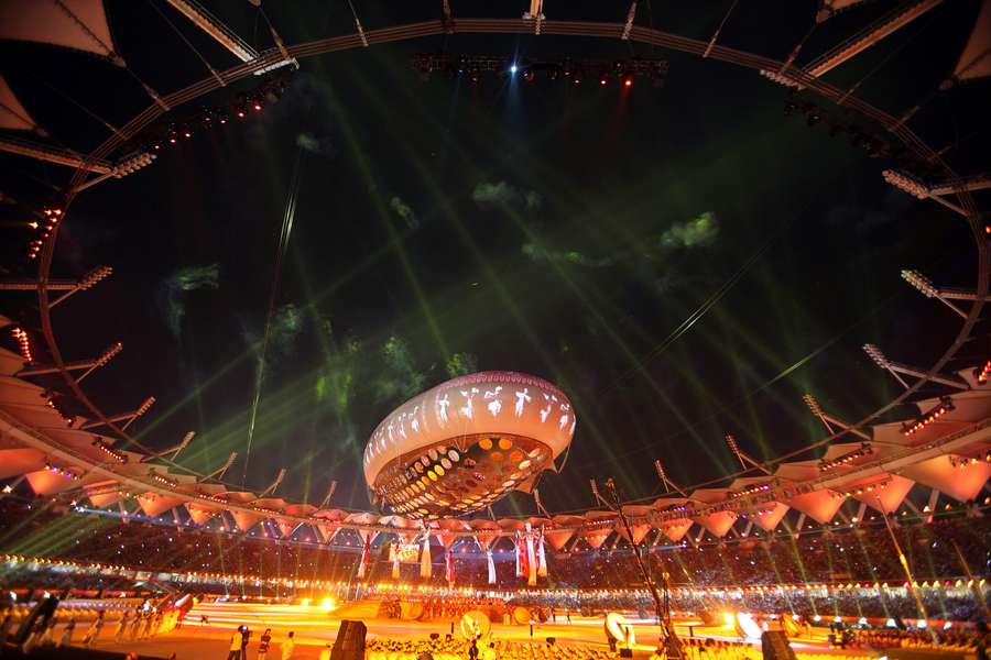 De openingsceremonie van de Commonwealth Games in Jawaharlal Nehru Stadium in New Delhi (2010)