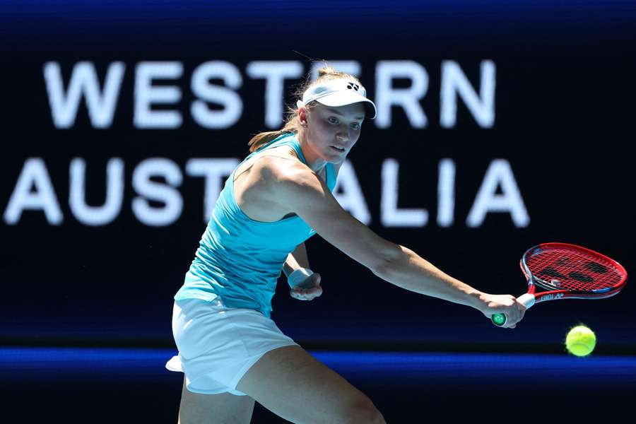 Rybakina hits a return against Sakkari