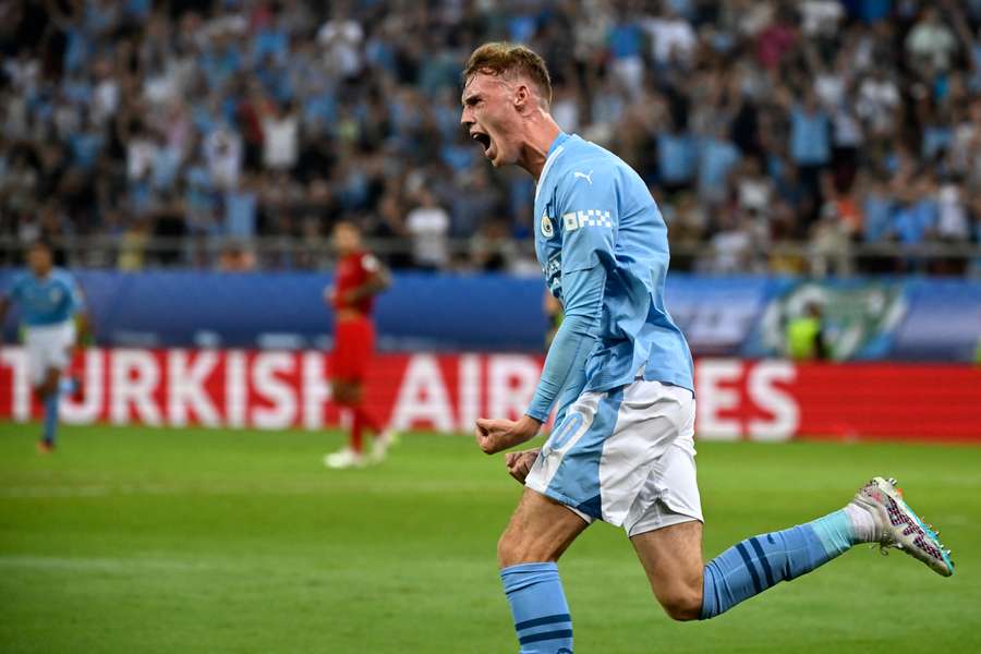 Manchester City's English midfielder #80 Cole Palmer celebrates scoring his team's first goal