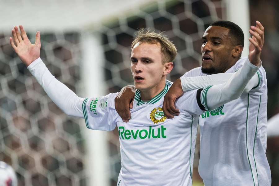 Hammarby goal scorers Victor Lind (L) and Paulos Abraham celebrate the former's penalty Hammarby goal scorers Victor Lind (L) and Paulos Abraham celebrate the former's penalty
