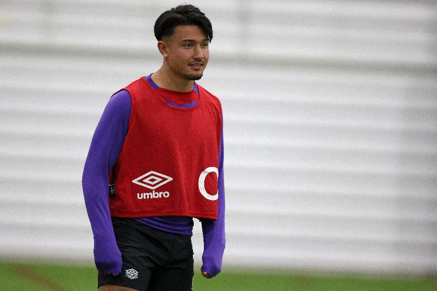 England fly-half Marcus Smith takes part in a training session