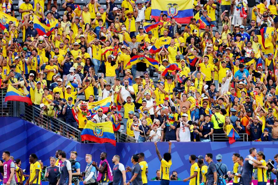 Ecuador fans celebrate after the match