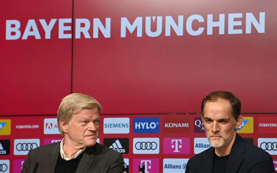 Bayern Munich's CEO Oliver Kahn and new head coach Thomas Tuchel sit together during a press conference in Munich