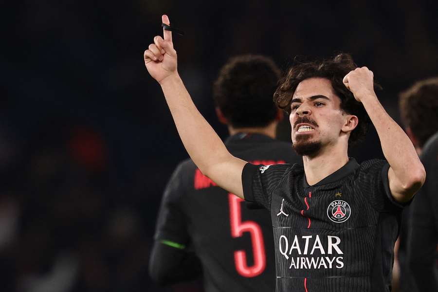 Vitinha celebrates after opening the scoring for PSG against Spurs