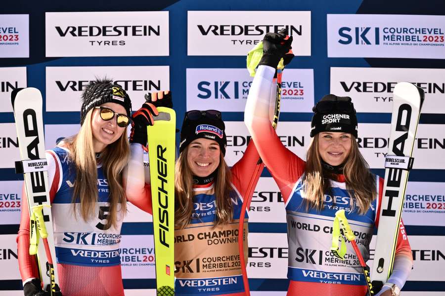 Second-placed Austria's Nina Ortlieb (L), first-placed Switzerland's Jasmine Flury (C) and third-placed Switzerland's Corinne Suter