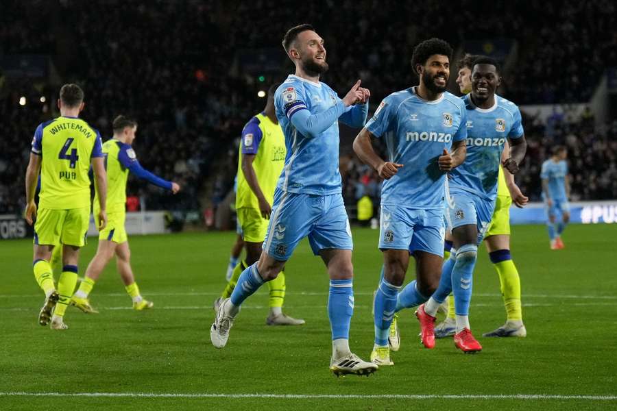 Matt Grimes of Coventry City celebrates their third goal