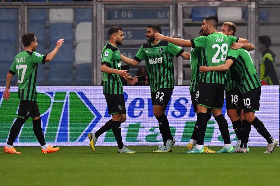 Sassuolo players celebrate the opening goal