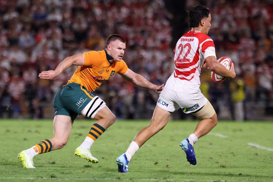 Isaac Henry of Australia competes with Shunsuke Uenobo Isaac Henry of Australia competes with Shunsuke Uenobo