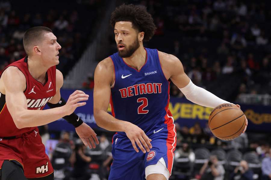 Cade Cunningham backing down Tyler Herro in the Piston's overtime win against the Heat