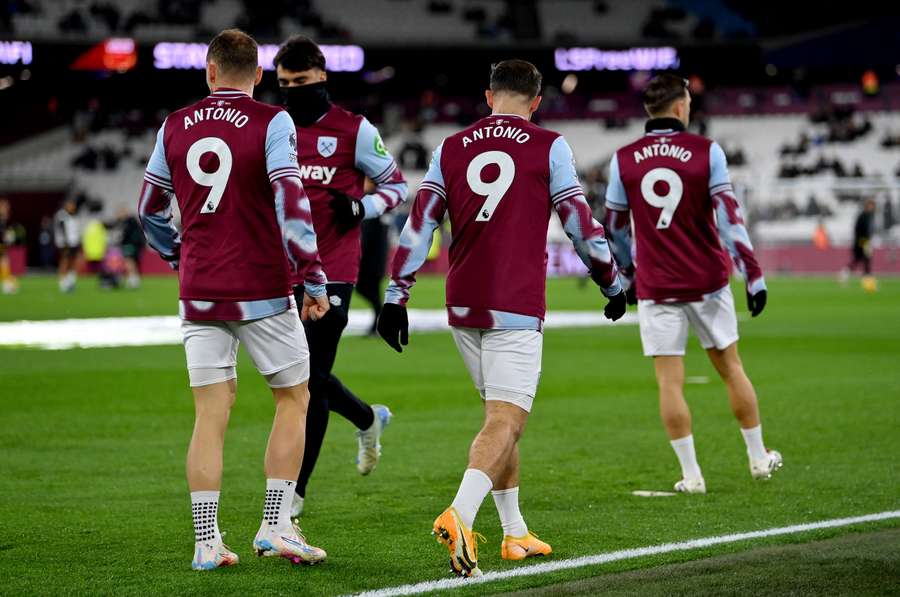 Players of West Ham wear shirts in support of their injured teammate Michail Antonio prior to the match between West Ham and Wolves