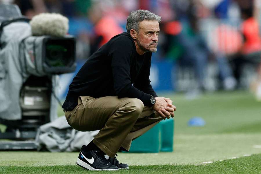 Paris St Germain coach Luis Enrique looks on