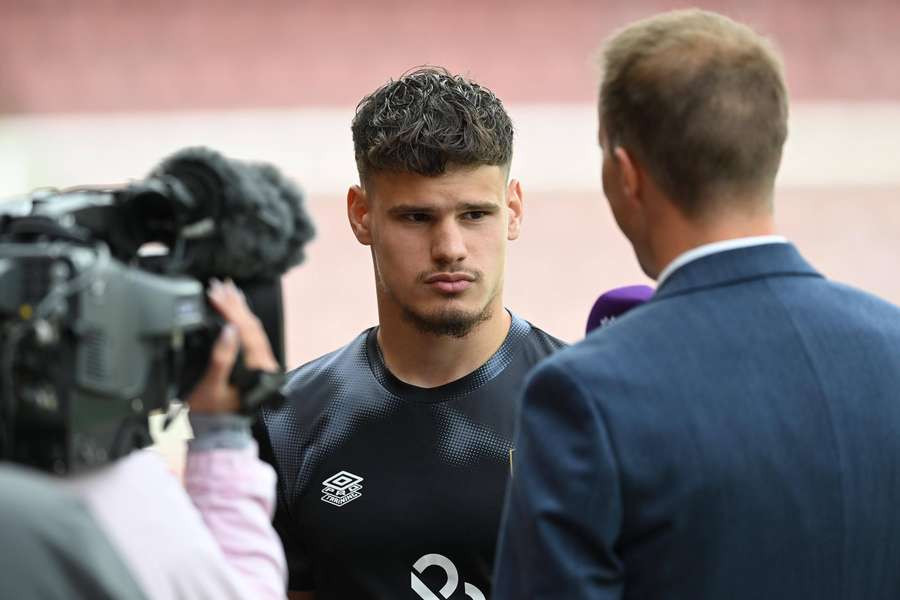 Milos Kerkez being interviewed ahead of the Premier League match between Bournemouth and Leicester City
