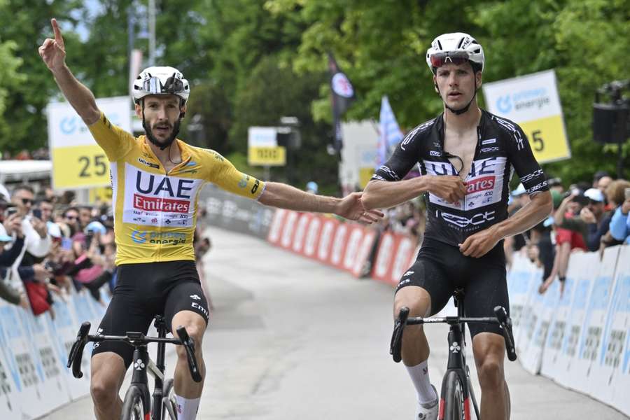 Adam Yates (L) wins ahead of Joao Almeida