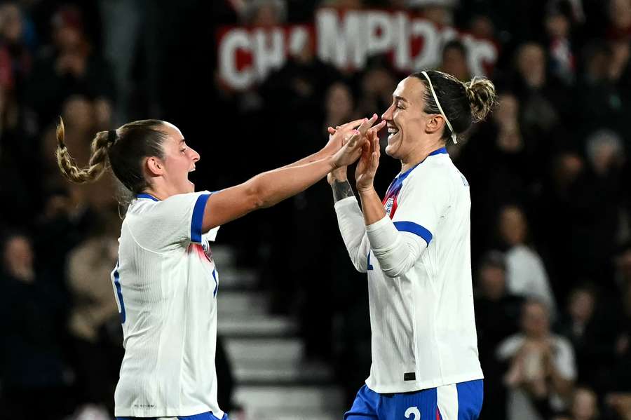 England's defender #02 Lucy Bronze (R) celebrates scoring the team's second goal  England's defender #02 Lucy Bronze (R) celebrates scoring the team's second goal