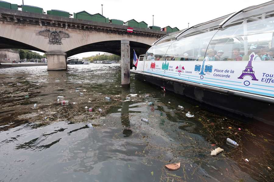 A tour boat cruises the Seine river in Paris on June 28th, 2023