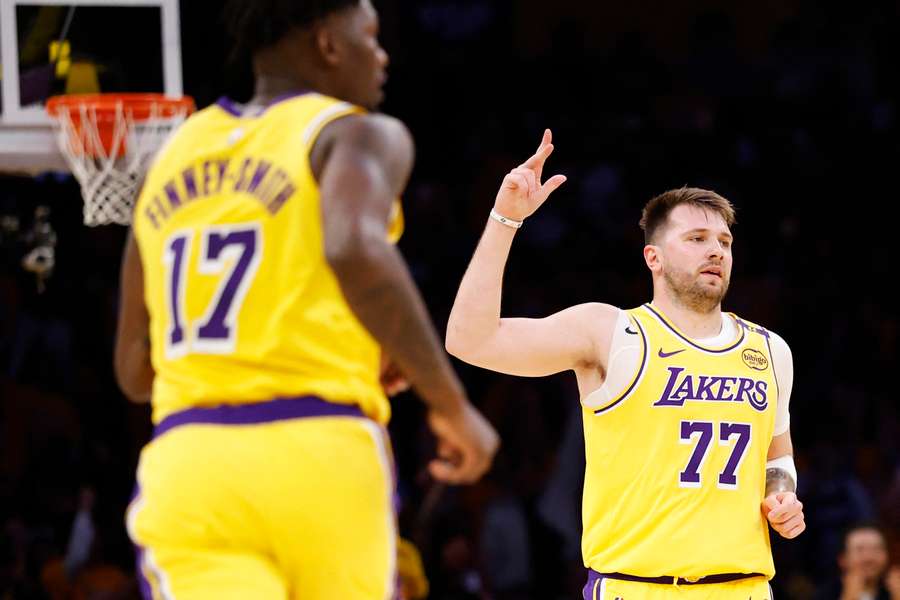 Luka Doncic of the Los Angeles Lakers reacts after a three-point basket during the first quarter against the Utah Jazz