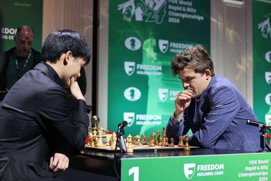 MAGNUS CARLSEN, right, in action against LIANG AWONDER during the FIDE World Rapid Chess Championship