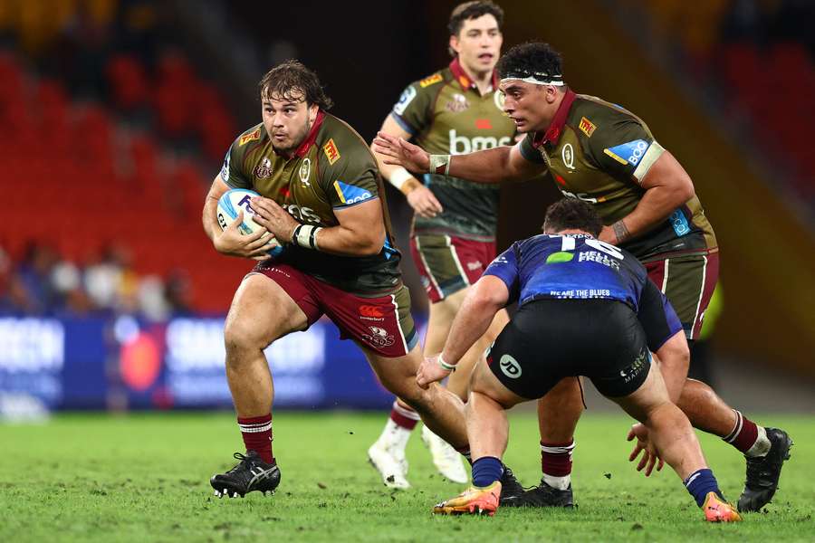 Big Massimo De Lutiis runs with ball in hand against the Auckland Blues.