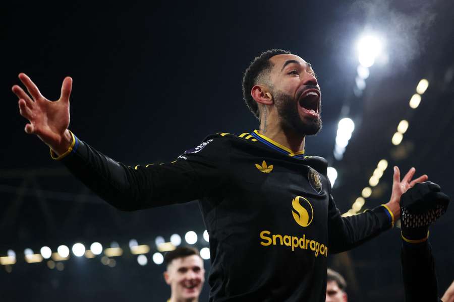 Matheus Cunha celebrates after giving Manchester United the late win