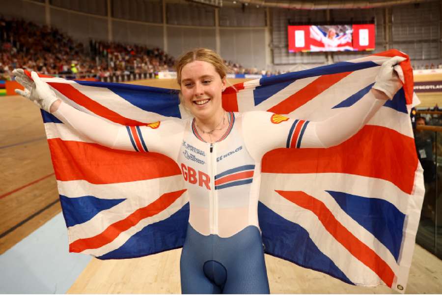 Britain's Emma Finucane celebrates winning the gold medal after the women's elite sprint final