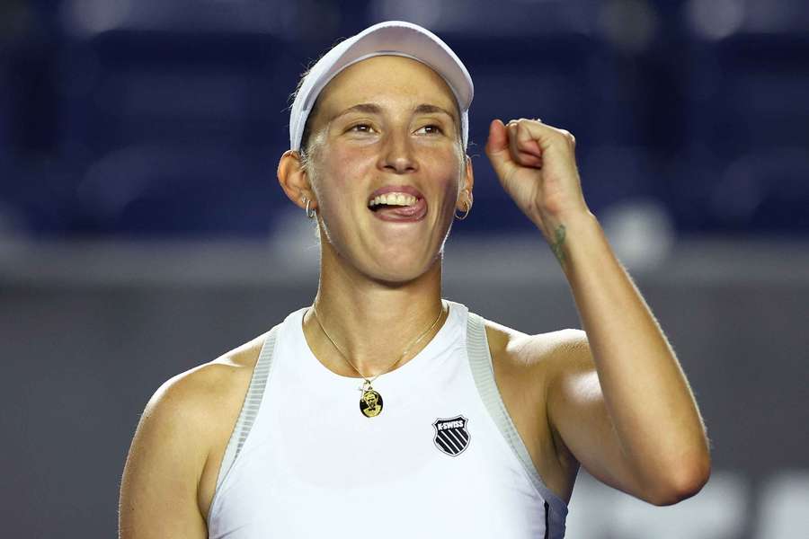 Belgium's Elise Mertens celebrates after winning her semi-final match against the Czech Republic's Nikola Bartunkova