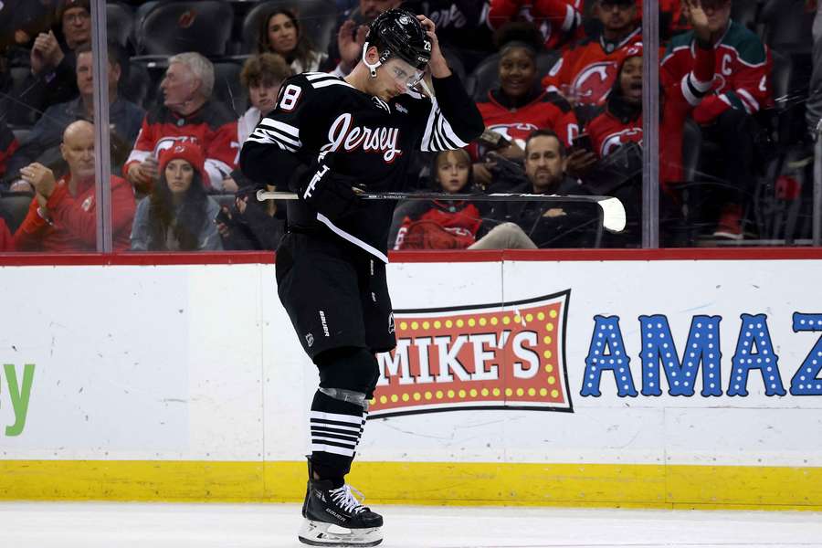 New Jersey Devils' Timo Meier leaves the game with his head hung low after receiving a game misconduct