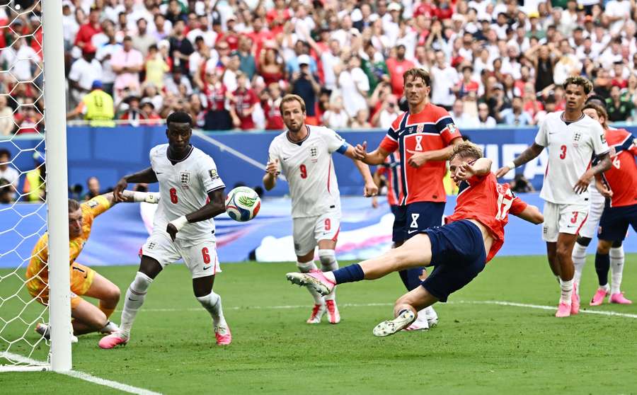 Norway's Torbjorn Heggem scores a goal that was later disallowed. Norway's Torbjorn Heggem scores a goal that was later disallowed.