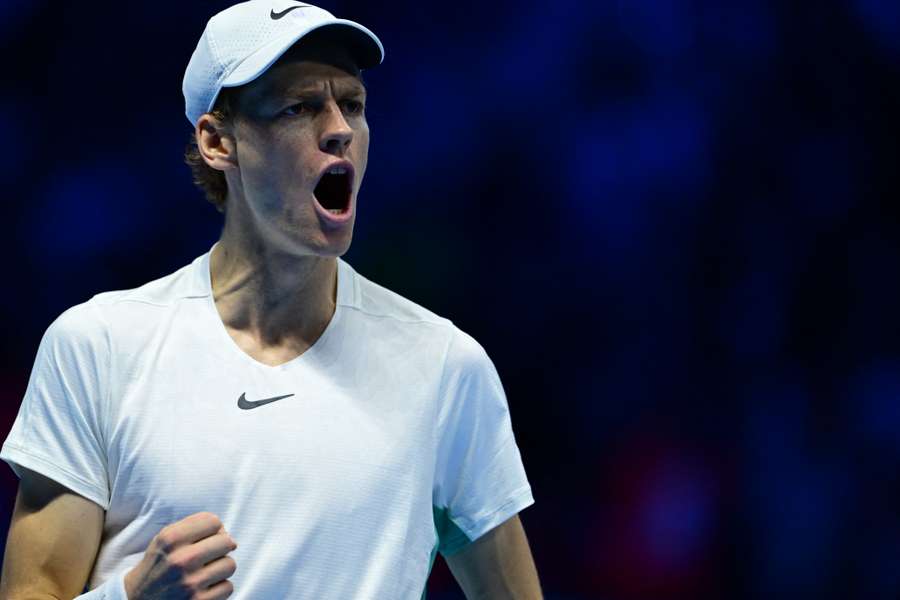 Jannik Sinner celebrates a point against Holger Rune during their first round-robin match in Turin