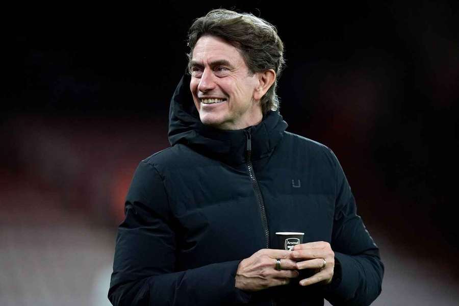 Tottenham manager Thomas Frank holding a cup adorned with the Arsenal badge before the Premier League match against Bournemouth