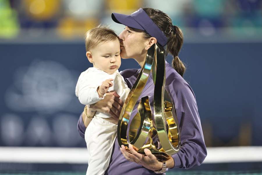 Bencic celebrates her trophy with her baby