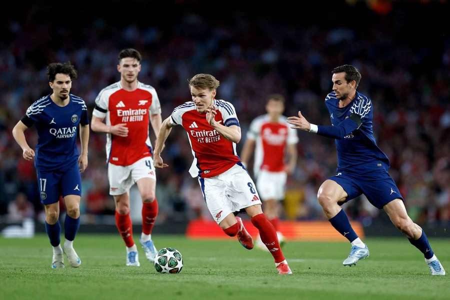 Arsenal's Martin Odegaard gets away from PSG's Fabian Ruiz during the Champions League, Semi-Final 1st Legon April 29, 2025