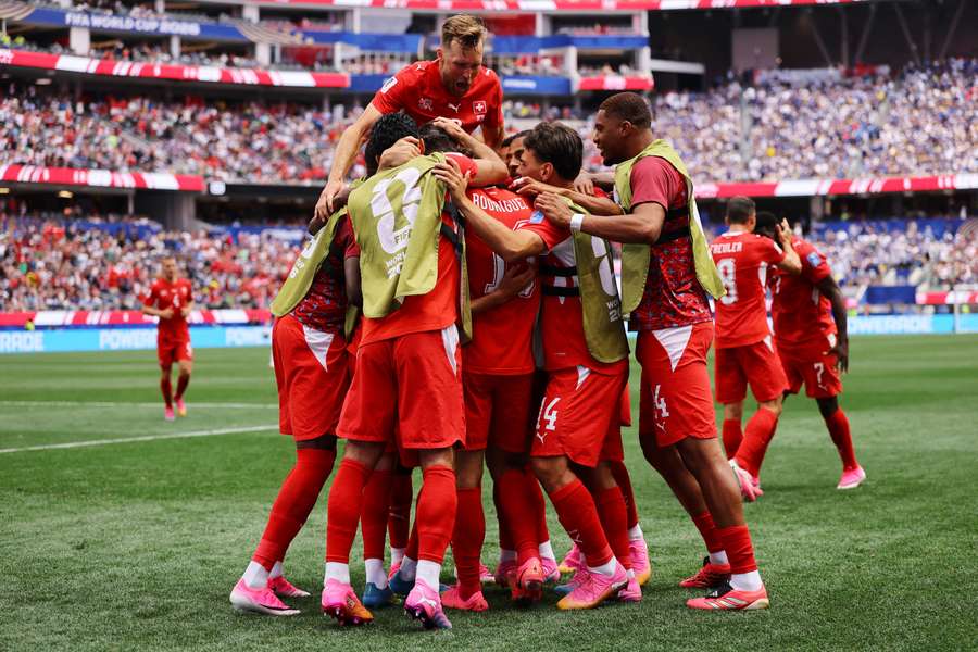Ruben Vargas celebrates scoring Switzerland's second goal with teammates