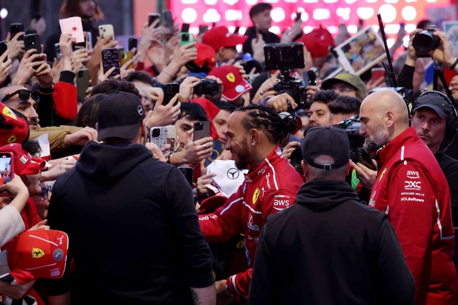 Lewis Hamilton and Charles Leclerc greet fans in Milan