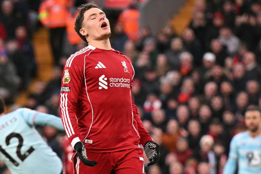 Liverpool's German midfielder #07 Florian Wirtz reacts after missing a chance 