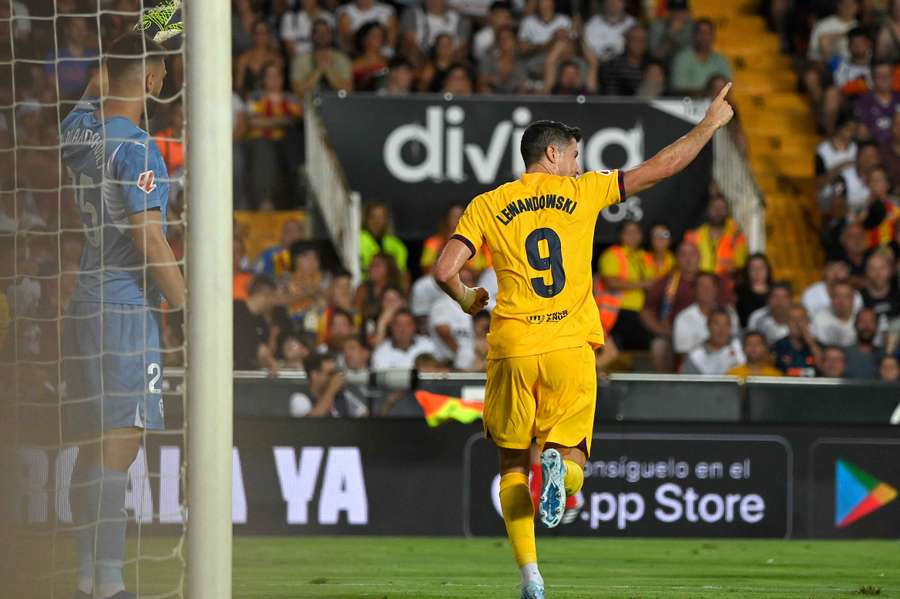 Robert Lewandowski celebrates his second goal