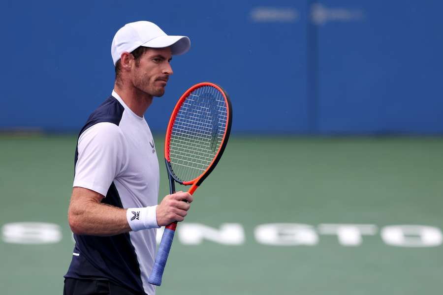 Andy Murray of Great Britain celebrates after winning a point against Taylor Fritz