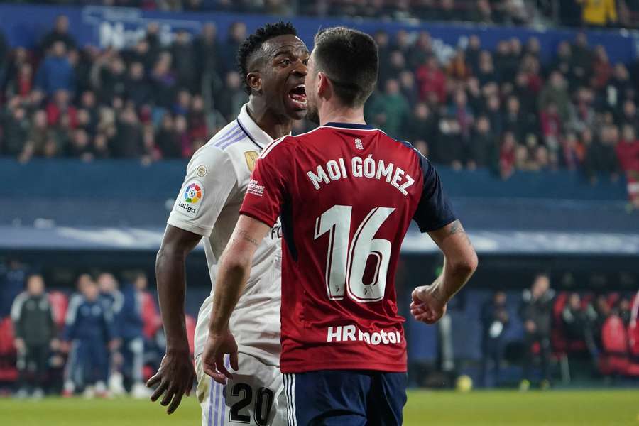 Moi Gomez argues with Real Madrid's Brazilian forward Vinicius Junior during the Spanish League football match between CA Osasuna and Real Madrid CF
