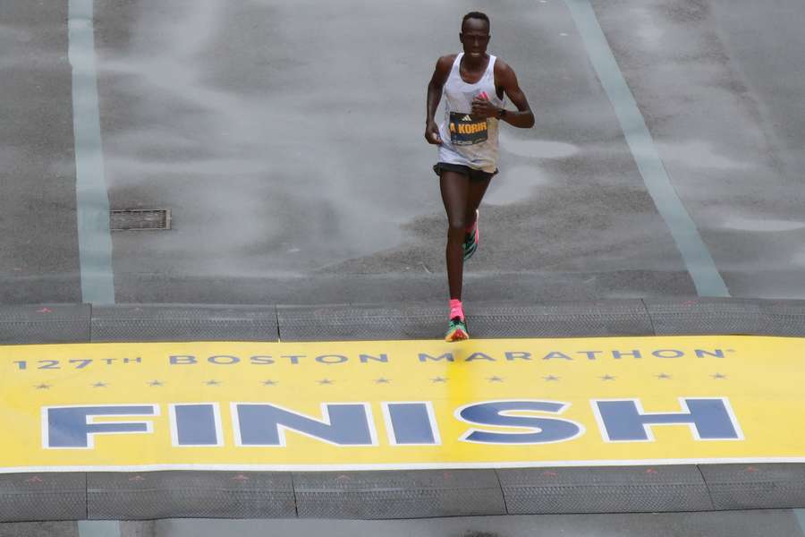 John Korir of Kenya crosses the finish line