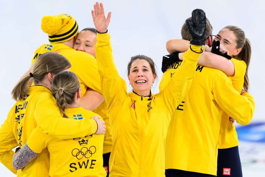 Hasselborg (centre) amid Swedish title celebrations Hasselborg (centre) amid Swedish title celebrations