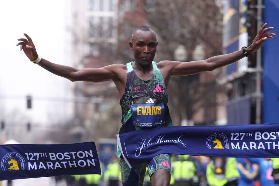 Evans Chebet of Kenya celebrates after successfully defending his Boston Marathon title