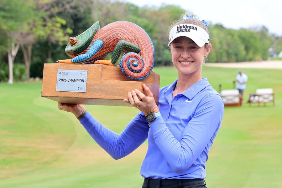 Korda celebrates with her trophy