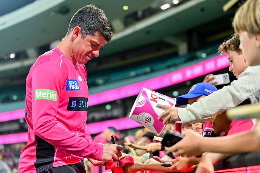 Moises Henriques signing autographs for Sydney Sixers fans last summer. Moises Henriques signing autographs for Sydney Sixers fans last summer.