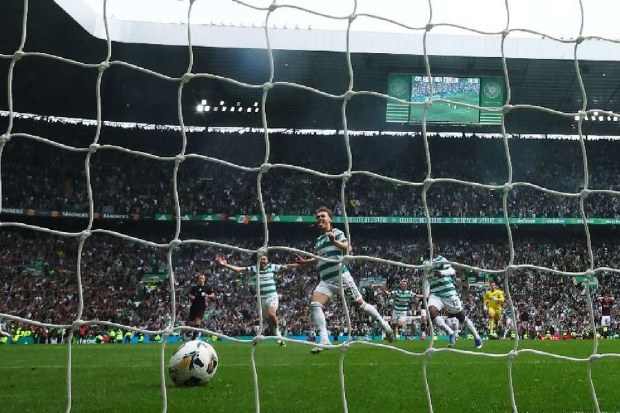 Celtic players celebrate after dramatic last-second goal