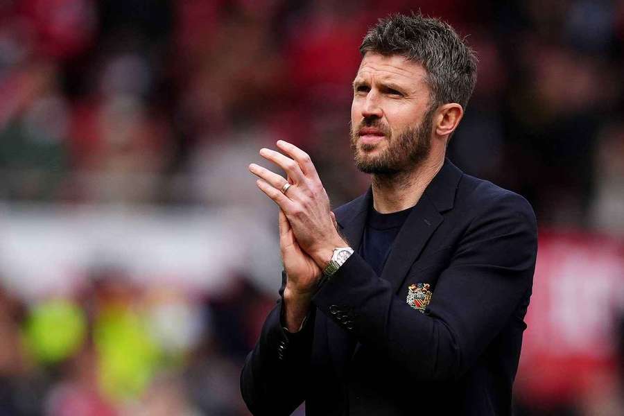 Michael Carrick applauds supporters after their win over Nottingham Forest on Sunday