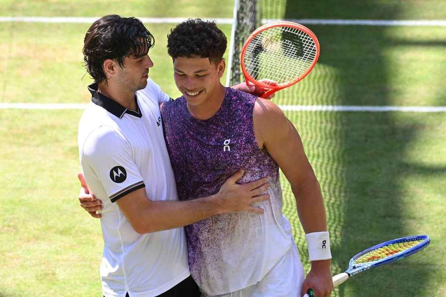Taylor Fritz (L) and Ben Shelton embrace after the match Taylor Fritz (L) and Ben Shelton embrace after the match