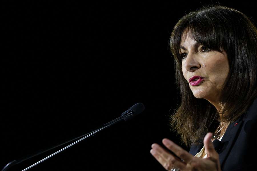 Paris mayor Anne Hidalgo has also been under pressure over a prolonged stay in the Pacific